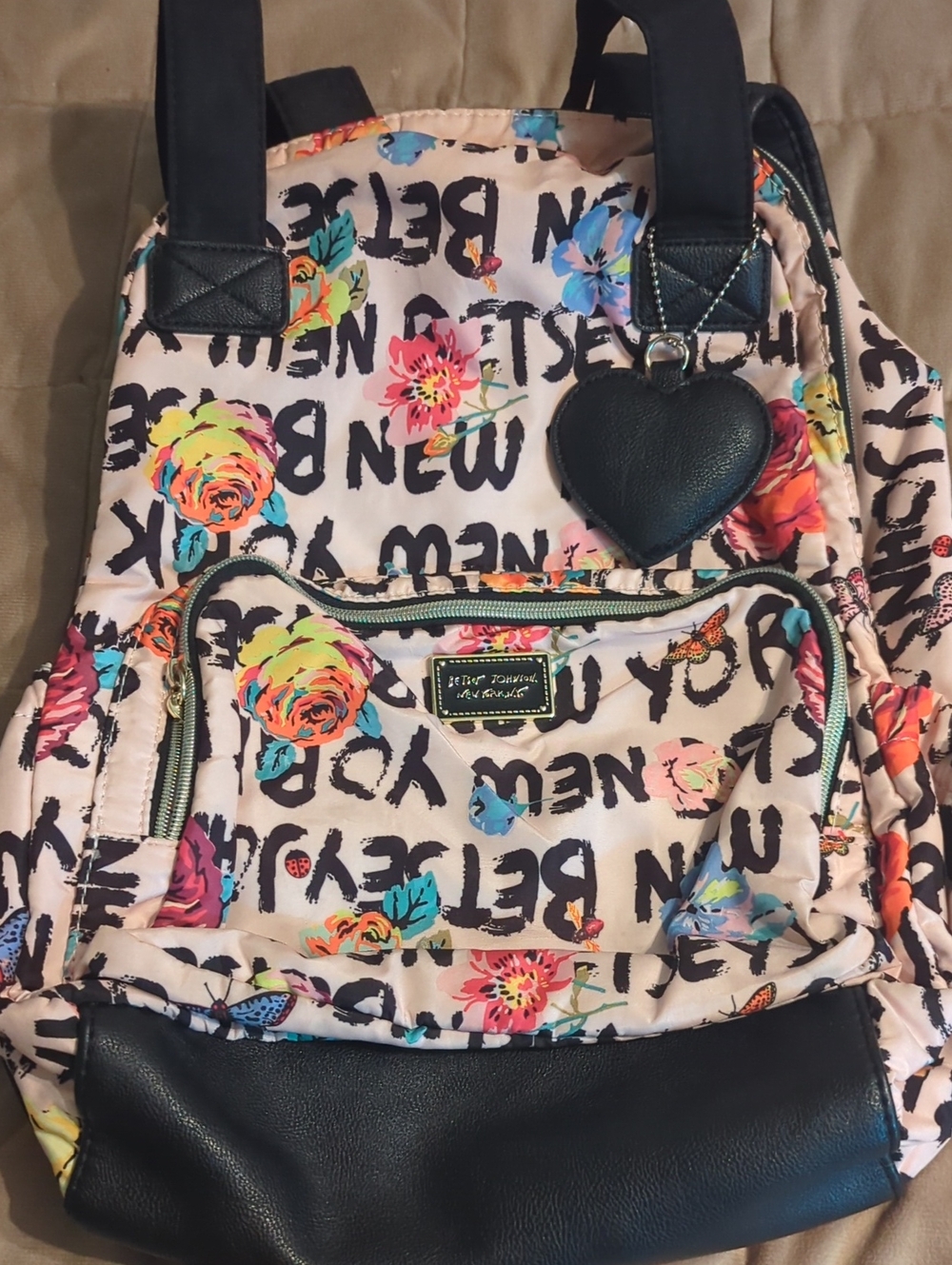 Betsey Johnson Pink Floral Logo Backpack with Black Trim and Heart Charm